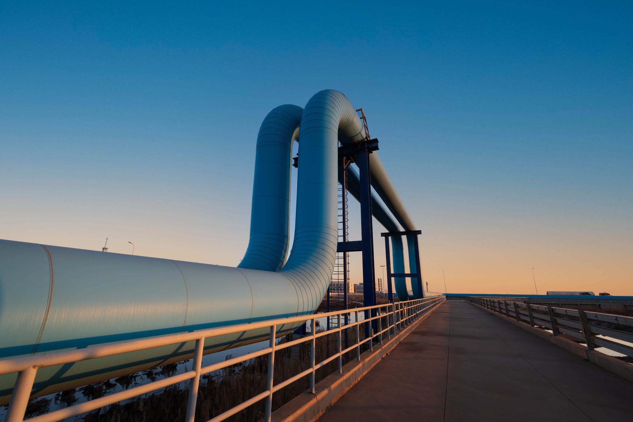Oil pipeline in the sunset