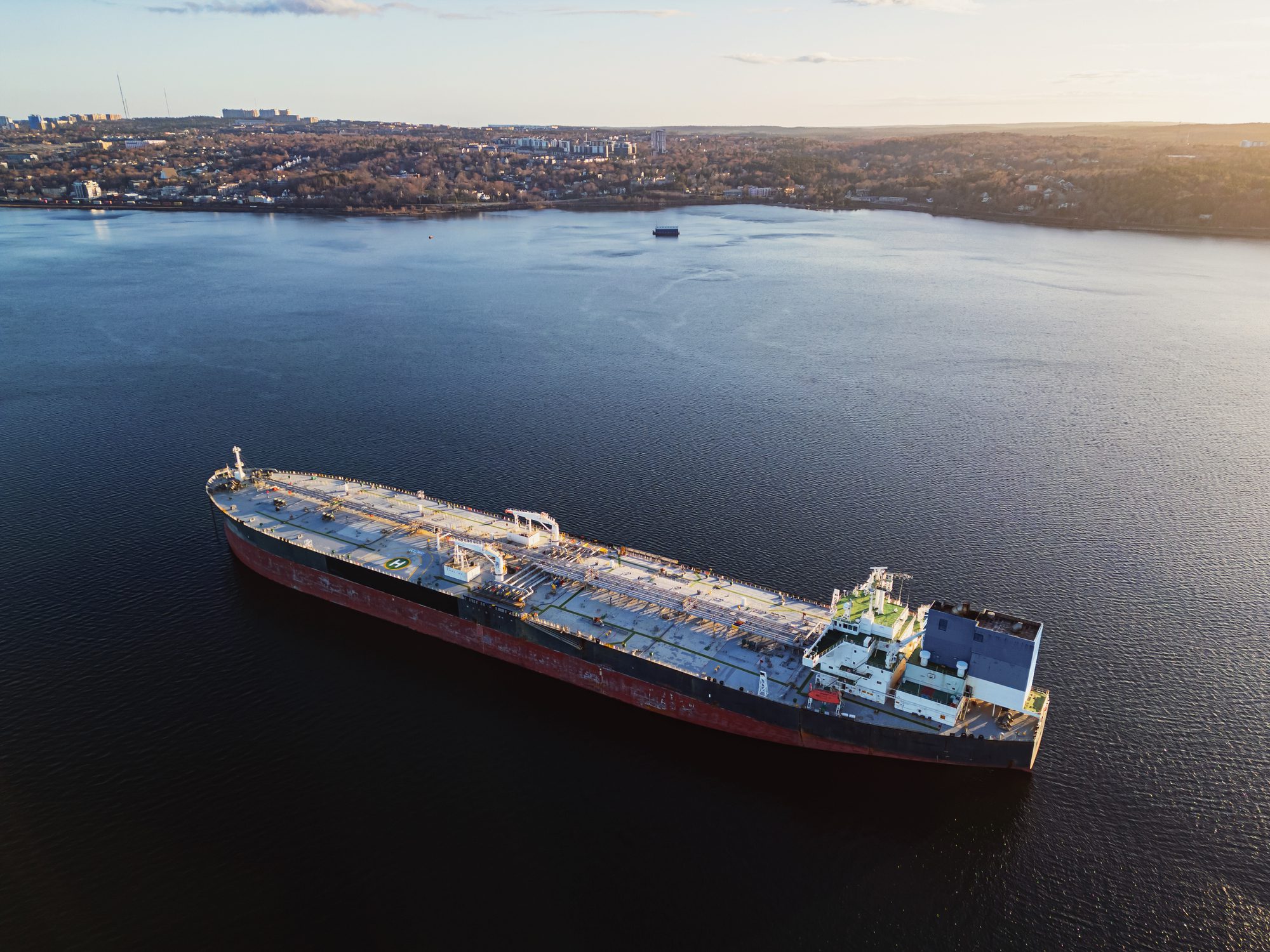 A large crude oil tanker ship is anchored in a basin on the Atlantic coast.